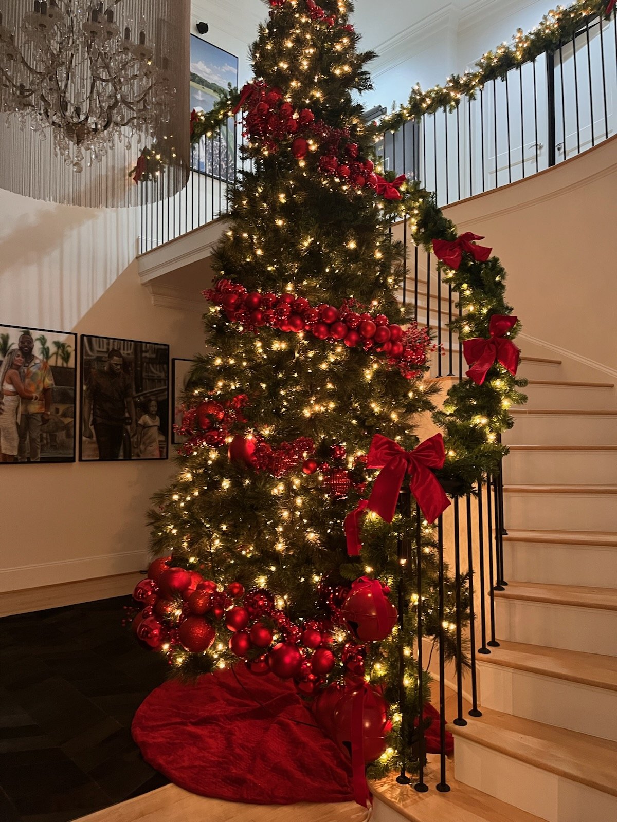 Red tree with staircase garland